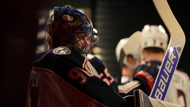 Apr 2, 2026; Raleigh, North Carolina, USA; Columbus Blue Jackets goaltender Elvis Merzlikins (90) looks on outside the locker room before the game against the Carolina Hurricanes at Lenovo Center. Mandatory Credit: James Guillory-Imagn Images Apr 2, 2026; Raleigh, North Carolina, USA; Columbus Blue Jackets goaltender Elvis Merzlikins (90) looks on outside the locker room before the game against the Carolina Hurricanes at Lenovo Center. Mandatory Credit: James Guillory-Imagn Images