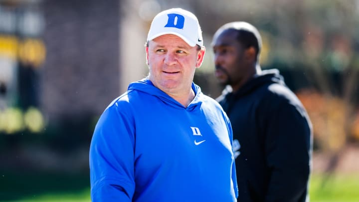 Nov 25, 2023; Durham, North Carolina, USA; Duke Blue Devils head coach Mike Elko looks on before the first half of the game against Pittsburgh Panthers at Wallace Wade Stadium. Nov 25, 2023; Durham, North Carolina, USA; Duke Blue Devils head coach Mike Elko looks on before the first half of the game against Pittsburgh Panthers at Wallace Wade Stadium.