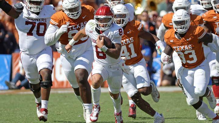 Oklahoma quarterback Dillon Gabriel (8) carries the ball during his team's game against Texas at the Cotton Bowl in Dallas, Saturday, Oct. 7, 2023. Oklahoma quarterback Dillon Gabriel (8) carries the ball during his team's game against Texas at the Cotton Bowl in Dallas, Saturday, Oct. 7, 2023.