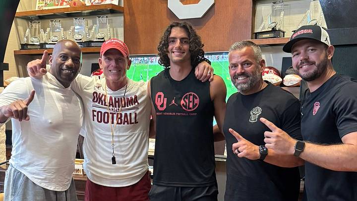 Wide receiver prospect Carson LaCombe poses for a photo with Oklahoma coach Brent Venables and wide receivers coach Emmett Jones after camp. Wide receiver prospect Carson LaCombe poses for a photo with Oklahoma coach Brent Venables and wide receivers coach Emmett Jones after camp.
