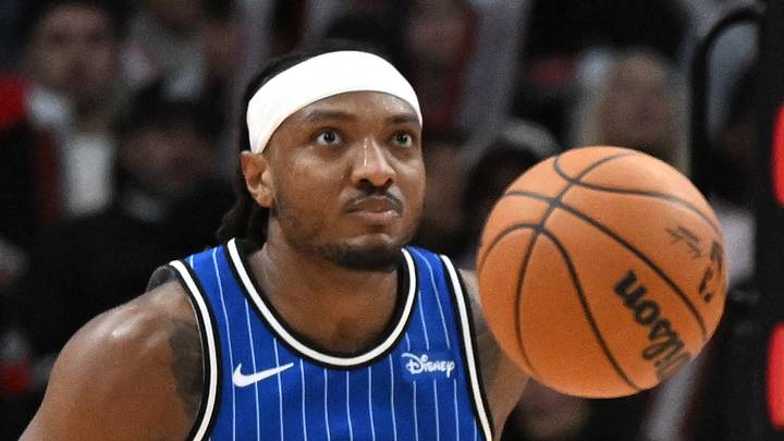 Toronto Raptors forward Collin Murray-Boyles passes the ball away from Orlando Magic center Wendell Carter Jr. Toronto Raptors forward Collin Murray-Boyles passes the ball away from Orlando Magic center Wendell Carter Jr.