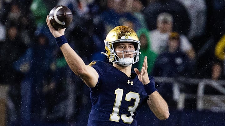 Notre Dame Fighting Irish quarterback CJ Carr (13) throws against the Southern California Trojans at Notre Dame Stadium.