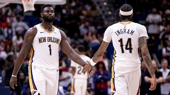 Nov 1, 2024; New Orleans, Louisiana, USA;  New Orleans Pelicans forward Brandon Ingram (14) slaps hands with forward Zion Williamson (1) after a play against the Indiana Pacers during the second half at Smoothie King Center. Mandatory Credit: Stephen Lew-Imagn Images