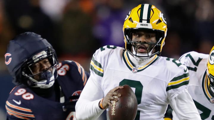 Green Bay Packers quarterback Malik Willis scrambles against the Chicago Bears.