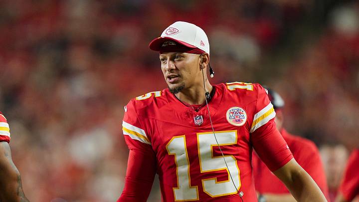 Aug 22, 2025; Kansas City, Missouri, USA; Kansas City Chiefs quarterback Patrick Mahomes (15) congratulates Kansas City Chiefs running back Elijah Mitchell (25) after scoring a touchdown against the Chicago Bears at GEHA Field at Arrowhead Stadium. Mandatory Credit: Jay Biggerstaff-Imagn Images