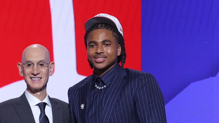 Jun 25, 2025; Brooklyn, NY, USA; Collin Murray-Boyles stands with NBA commissioner Adam Silver after being selected as the ninth pick by the Toronto Raptors in the first round of the 2025 NBA Draft at Barclays Center. Mandatory Credit: Brad Penner-Imagn Images Jun 25, 2025; Brooklyn, NY, USA; Collin Murray-Boyles stands with NBA commissioner Adam Silver after being selected as the ninth pick by the Toronto Raptors in the first round of the 2025 NBA Draft at Barclays Center. Mandatory Credit: Brad Penner-Imagn Images