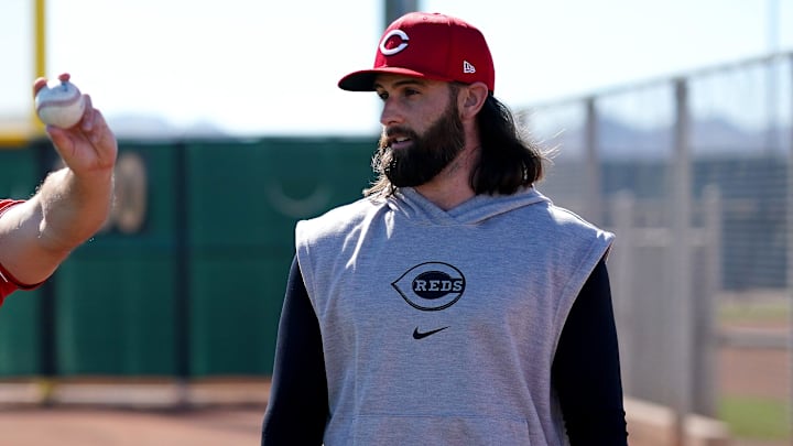 Cincinnati Reds relief pitcher Brent Suter (31), left, and Cincinnati Reds relief pitcher Tejay