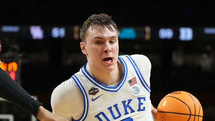 Apr 5, 2025; San Antonio, TX, USA; Duke Blue Devils forward Cooper Flagg (2) controls the ball against Houston Cougars forward J'Wan Roberts (13) during the second half in the semifinals of the men's Final Four of the 2025 NCAA Tournament at the Alamodome. Mandatory Credit: Bob Donnan-Imagn Images Apr 5, 2025; San Antonio, TX, USA; Duke Blue Devils forward Cooper Flagg (2) controls the ball against Houston Cougars forward J'Wan Roberts (13) during the second half in the semifinals of the men's Final Four of the 2025 NCAA Tournament at the Alamodome. Mandatory Credit: Bob Donnan-Imagn Images