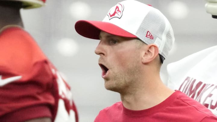 Then-Arizona Cardinals linebackers coach Sam Siefkes talks to his players during training camp in 2024.