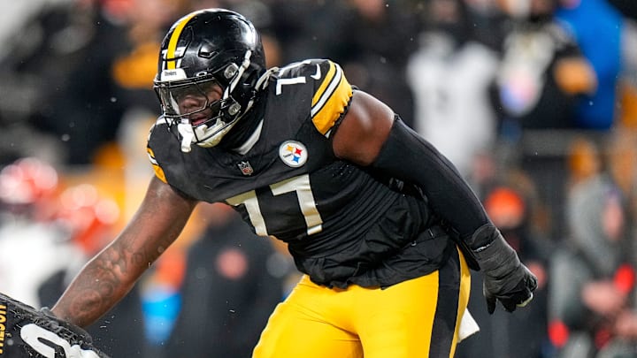 Pittsburgh Steelers quarterback Russell Wilson (3) is helped to his feet by offensive tackle Broderick Jones (77) in the fourth quarter of the NFL Week 18 game between the Pittsburgh Steelers and the Cincinnati Bengals at Acrisure Stadium in Pittsburgh on Saturday, Jan. 4, 2025. The Bengals won 19-17 to finish the regular season at 9-8.