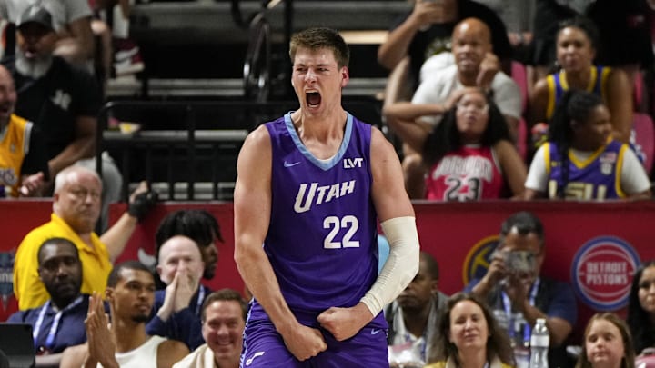 Jul 14, 2025; Las Vegas, NV, USA; Utah Jazz forward Kyle Filipowski (22) reacts after scoring against the San Antonio Spurs during overtime in a NBA basketball game at the Thomas & Mack Center. Mandatory Credit: Lucas Peltier-Imagn Images