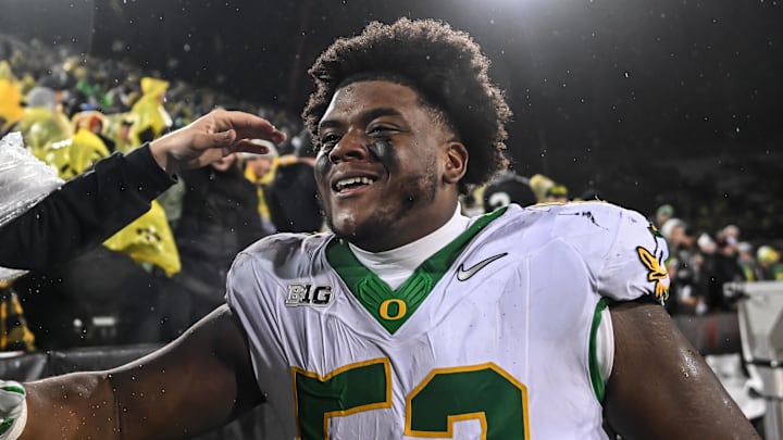 Nov 8, 2025; Iowa City, Iowa, USA; Oregon Ducks defensive lineman A'Mauri Washington (52) reacts with fans after the game against the Iowa Hawkeyes at Kinnick Stadium. Mandatory Credit: Jeffrey Becker-Imagn Images