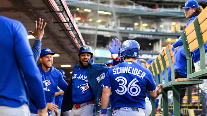 Apr 20, 2026; Anaheim, California, USA; Toronto Blue Jays first baseman Vladimir Guerrero Jr. (27) is greeted by teammates after scoring during the third inning against the Los Angeles Angels at Angel Stadium. Mandatory Credit: William Liang-Imagn Images