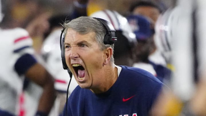 Arizona head coach Brent Brennan celebrates during a game against Arizona State at Mountain America Stadium in Tempe on Nov. 28, 2025.