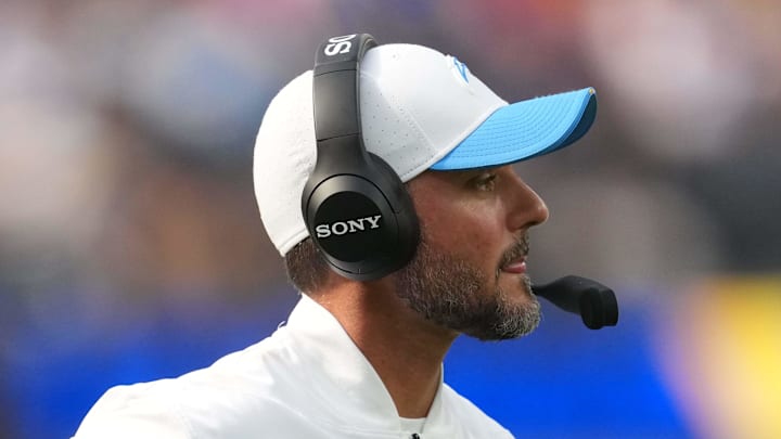 Los Angeles Chargers defensive coordinator Jesse Minter watches from the sidelines against the Los Angeles Rams.