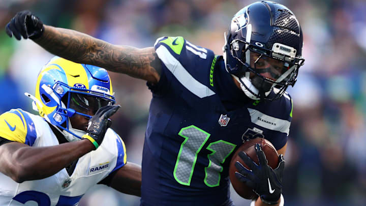 Jan 25, 2026; Seattle, WA, USA; Seattle Seahawks wide receiver Jaxon Smith-Njigba (11) runs against Los Angeles Rams cornerback Roger McCreary (25) during the first half in the 2026 NFC Championship Game at Lumen Field. Mandatory Credit: Kevin Ng-Imagn Images