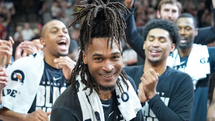 Feb 7, 2026; San Antonio, Texas, USA;  San Antonio Spurs guard Stephon Castle (5) beats the drum after the game against the Dallas Mavericks at Frost Bank Center. Mandatory Credit: Daniel Dunn-Imagn Images