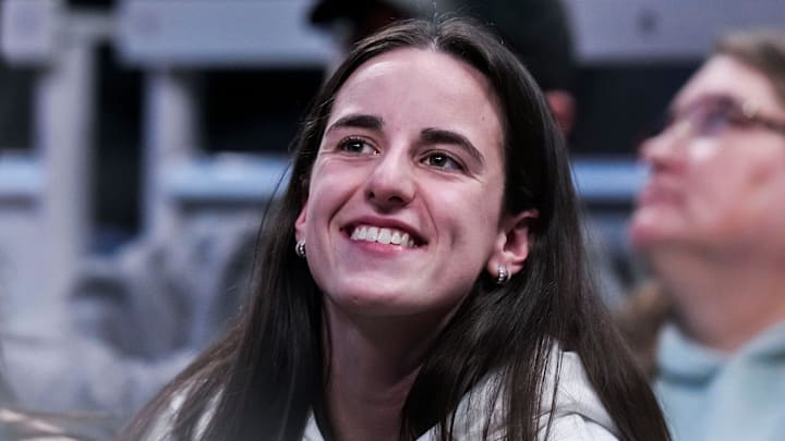 Indiana Fever guard Caitlin Clark (22) smiles Thursday, March 6, 2025, in a round two game at the 2025 TIAA Big Ten Women's Basketball Tournament between the Iowa Hawkeyes and the Michigan State Spartans at Gainbridge Fieldhouse in Indianapolis. Indiana Fever guard Caitlin Clark (22) smiles Thursday, March 6, 2025, in a round two game at the 2025 TIAA Big Ten Women's Basketball Tournament between the Iowa Hawkeyes and the Michigan State Spartans at Gainbridge Fieldhouse in Indianapolis.