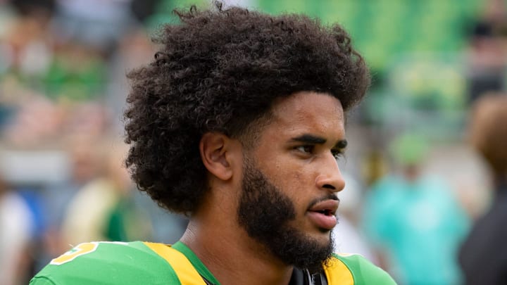 Oregon quarterback Dante Moore warms up as the Oregon Ducks host the Oklahoma State Cowboys on Sept. 6, 2025, at Autzen Stadium in Eugene, Oregon. 