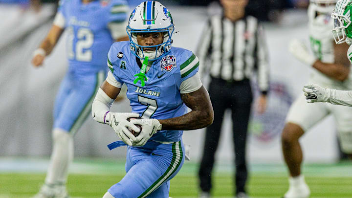 Dec 5, 2025; New Orleans, LA, USA;  Tulane Green Wave wide receiver Shazz Preston (7) runs against the North Texas Mean Green during the first half in the 2025 American Championship at Yulman Stadium.