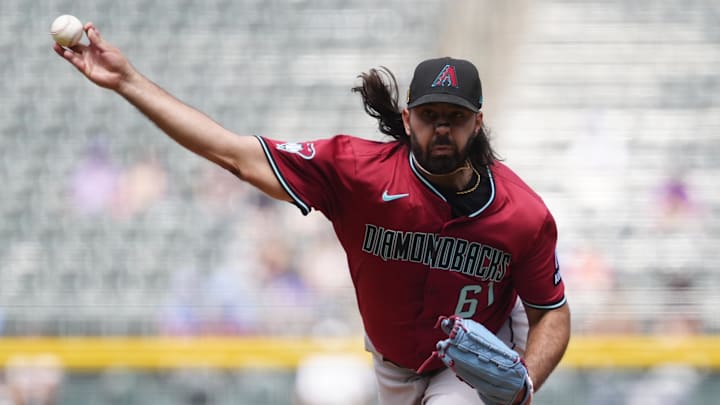 Aug 17, 2025; Denver, Colorado, USA; Arizona Diamondbacks starting pitcher Nabil Crismatt (61) delivers a pitch in the first inning against the Colorado Rockies at Coors Field. Mandatory Credit: Ron Chenoy-Imagn Images Aug 17, 2025; Denver, Colorado, USA; Arizona Diamondbacks starting pitcher Nabil Crismatt (61) delivers a pitch in the first inning against the Colorado Rockies at Coors Field. Mandatory Credit: Ron Chenoy-Imagn Images