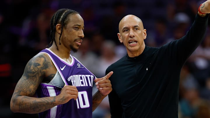 Mar 19, 2026; Sacramento, California, USA; Sacramento Kings guard DeMar DeRozan (10) is instructed by head coach Doug Christie during the fourth quarter against the Philadelphia 76ers at Golden 1 Center.
