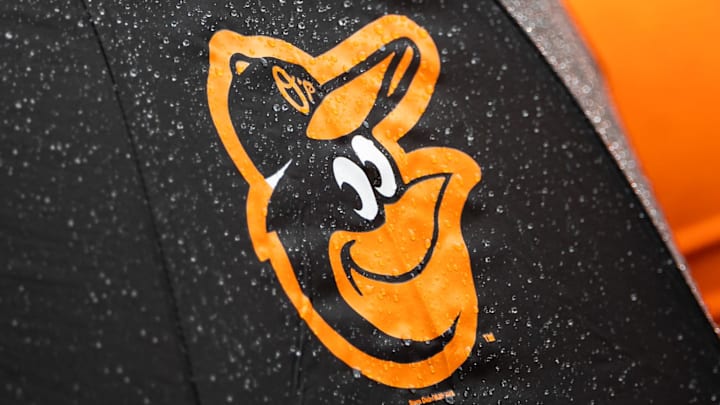 Aug 22, 2021; Baltimore, Maryland, USA; A Baltimore Orioles logo is seen on an umbrella during the game between the Baltimore Orioles and the Atlanta Braves at Oriole Park at Camden Yards.