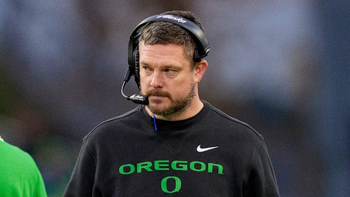 Oregon head coach Dan Lanning walks off the field after a timeout as the Oregon Ducks take on the Washington Huskies on Nov. 29, 2025, at Husky Stadium in Seattle, Washington.