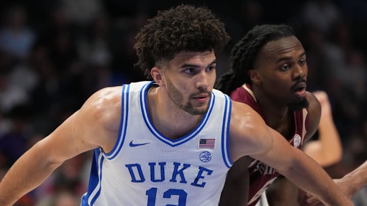 Mar 12, 2026; Charlotte, NC, USA; Duke Blue Devils forward Cameron Boozer (12) under the basket in the first half at Spectrum Center. Mandatory Credit: Bob Donnan-Imagn Images