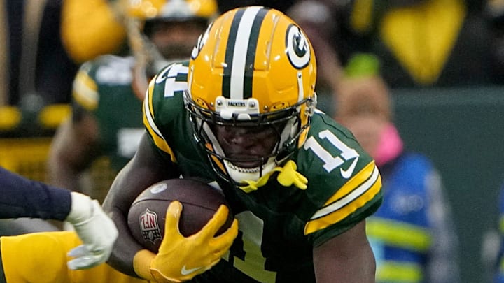 Green Bay Packers wide receiver Jayden Reed (11) makes a 44-yard reception during the second quarter of their game against the Chicago Bears Sunday, January 7, 2024, at Lambeau Field in Green Bay, Wisconsin.