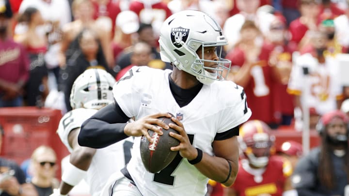 Sep 21, 2025; Landover, Maryland, USA; Las Vegas Raiders quarterback Geno Smith (7) looks to make a pass during the first half against the Washington Commanders at Northwest Stadium. Mandatory Credit: Amber Searls-Imagn Images Sep 21, 2025; Landover, Maryland, USA; Las Vegas Raiders quarterback Geno Smith (7) looks to make a pass during the first half against the Washington Commanders at Northwest Stadium. Mandatory Credit: Amber Searls-Imagn Images