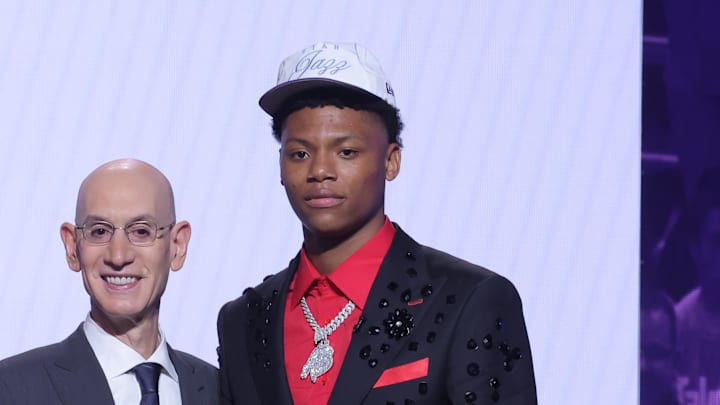 Jun 25, 2025; Brooklyn, NY, USA;  Ace Bailey stands with NBA commissioner Adam Silver after being selected as the fifth pick by the Utah Jazz in the first round of the 2025 NBA Draft at Barclays Center. Mandatory Credit: Brad Penner-Imagn Images