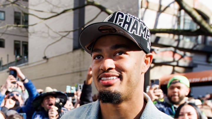 Seattle Seahawks wide receiver Jaxon Smith-Njigba looks on during the Super Bowl LX parade. Seattle Seahawks wide receiver Jaxon Smith-Njigba looks on during the Super Bowl LX parade.