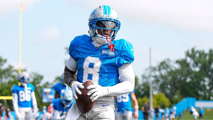 Former Detroit Lions wide receiver Greg Dortch (8) practices during training camp 