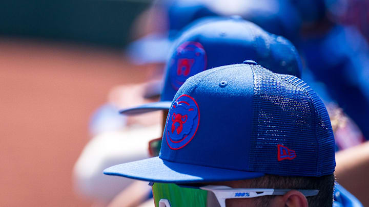 A general view hats belonging to Chicago Cubs players in the dugout during the first inning during a spring training game against the San Fracisco Giants at Scottsdale Stadium. A general view hats belonging to Chicago Cubs players in the dugout during the first inning during a spring training game against the San Fracisco Giants at Scottsdale Stadium.