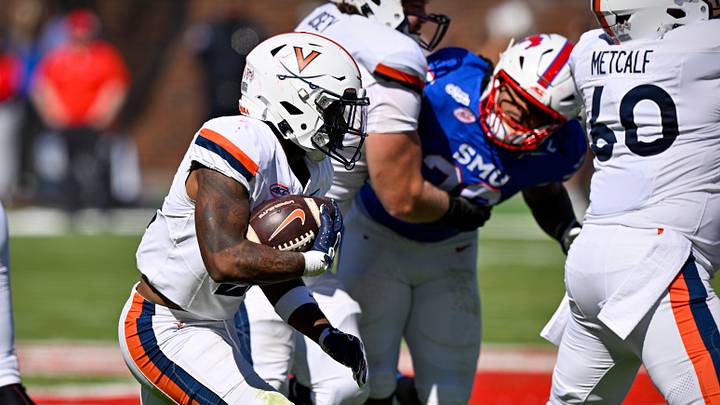 Oct 17, 2026; Dallas, Texas, USA; Virginia Cavaliers running back Jekail Middlebrook (21) runs with the ball against SMU during the first half at Gerald J. Ford Stadium. Mandatory Credit: Jerome Miron-Imagn Images
