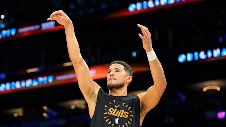 Nov 16, 2025; Phoenix, Arizona, USA; Phoenix Suns guard Devin Booker (1) warms up for a game against the Atlanta Hawks at Mortgage Matchup Center. Mandatory Credit: Allan Henry-Imagn Images Nov 16, 2025; Phoenix, Arizona, USA; Phoenix Suns guard Devin Booker (1) warms up for a game against the Atlanta Hawks at Mortgage Matchup Center. Mandatory Credit: Allan Henry-Imagn Images