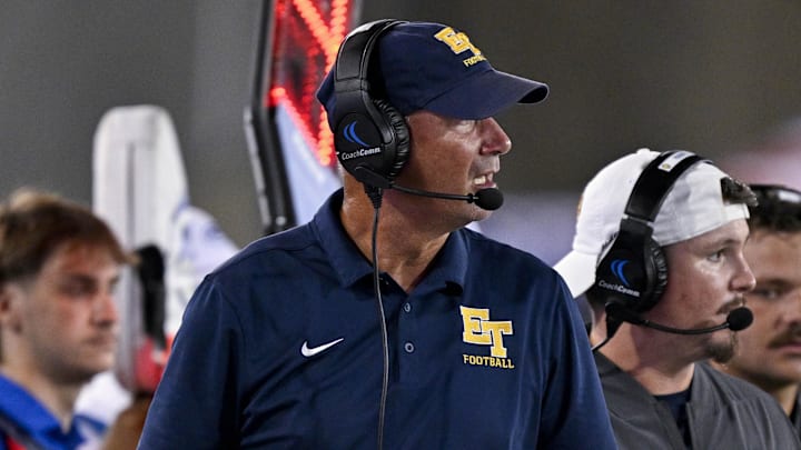 Aug 30, 2025; Dallas, Texas, USA; East Texas A&M Lions head coach Clint Dolezel looks on during the game between the Southern Methodist Mustangs and the East Texas A&M Lions at Gerald J. Ford Stadium. Mandatory Credit: Jerome Miron-Imagn Images Aug 30, 2025; Dallas, Texas, USA; East Texas A&M Lions head coach Clint Dolezel looks on during the game between the Southern Methodist Mustangs and the East Texas A&M Lions at Gerald J. Ford Stadium. Mandatory Credit: Jerome Miron-Imagn Images
