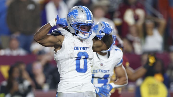 Detroit Lions running back Jahmyr Gibbs (0) celebrates after scoring a touchdown against Washington Commanders