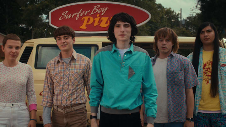 STRANGER THINGS. (L to R) Millie Bobby Brown as Eleven, Noah Schnapp as Will Byers, Finn Wolfhard as Mike Wheeler, Charlie Heaton as Jonathan Byers, and Eduardo Franco as Argyle in STRANGER THINGS. Cr. Courtesy of Netflix © 2022