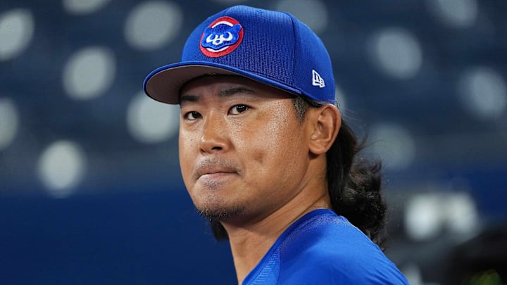 Aug 12, 2025; Toronto, Ontario, CAN; Chicago Cubs pitcher Shota Imanaga (18) walks onto the field during batting practice before a game against the Toronto Blue Jays at Rogers Centre. Mandatory Credit: Nick Turchiaro-Imagn Images