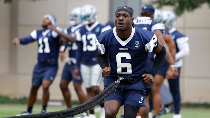 Dallas Cowboys safety Donovan Wilson goes through a drill during practice at the Ford Center at the Star Dallas Cowboys safety Donovan Wilson goes through a drill during practice at the Ford Center at the Star
