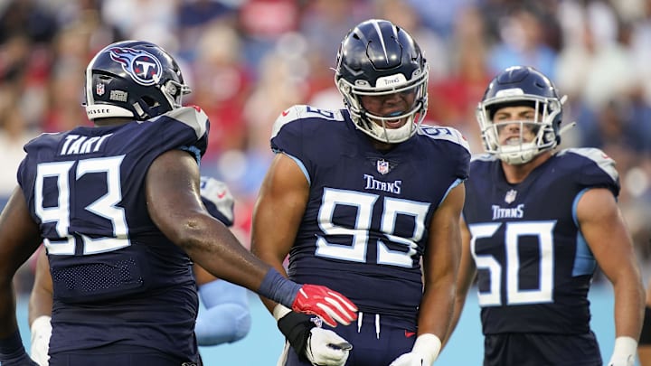 Aug 20, 2022; Nashville, Tennessee, USA; Tennessee Titans linebacker Rashad Weaver (99) celebrates after a quarterback sack against the Tampa Bay Buccaneers during the first quarter of a preseason game at Nissan Stadium. Aug 20, 2022; Nashville, Tennessee, USA; Tennessee Titans linebacker Rashad Weaver (99) celebrates after a quarterback sack against the Tampa Bay Buccaneers during the first quarter of a preseason game at Nissan Stadium.