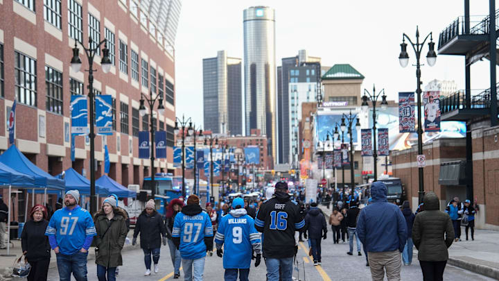 Football fans walk through Pride Plaza towards Gate A before the NFC divisional round between Lions and Commanders Football fans walk through Pride Plaza towards Gate A before the NFC divisional round between Lions and Commanders
