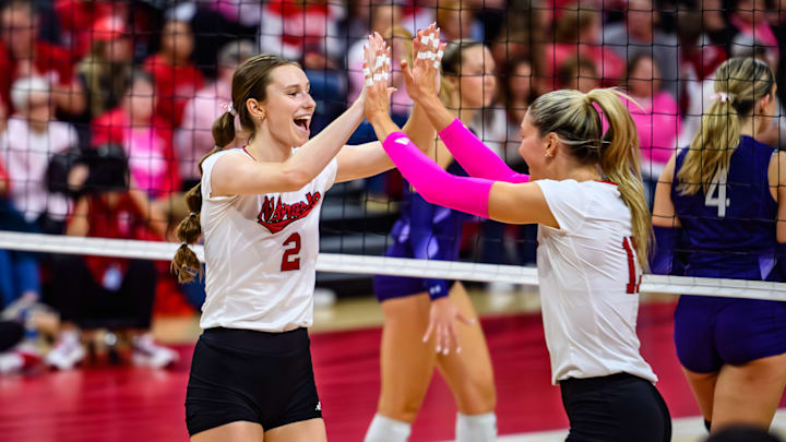 Nebraska setter Bergen Reilly high fives Andi Jackson after a kill. Reilly is the leading contender to win the Big Ten Setter of the Year Award. Nebraska setter Bergen Reilly high fives Andi Jackson after a kill. Reilly is the leading contender to win the Big Ten Setter of the Year Award.