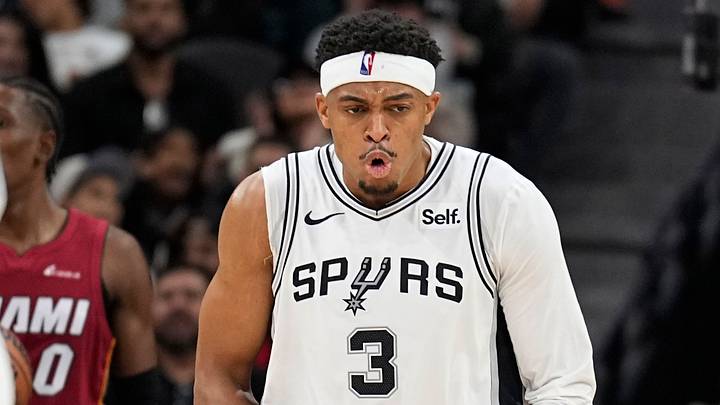 Nov 12, 2023; San Antonio, Texas, USA; San Antonio Spurs forward Keldon Johnson (3) reacts after drawing a foul while scoring during the second half against the Miami Heat at Frost Bank Center. Mandatory Credit: Scott Wachter-USA TODAY Sports