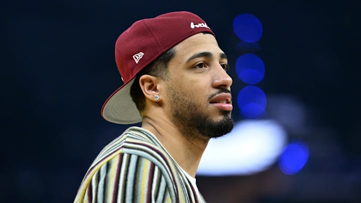 Indiana Pacers guard Tyrese Haliburton (0) on the sidelines during a game against the Golden State Warriors.