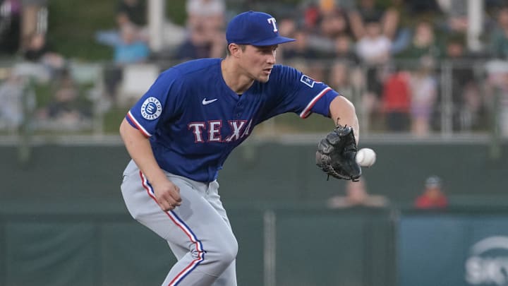 Apr 22, 2025; West Sacramento, California, USA; Texas Rangers shortstop Corey Seager (5) fields the ball during the second inning of the game against the Athletics at Sutter Health Park. 