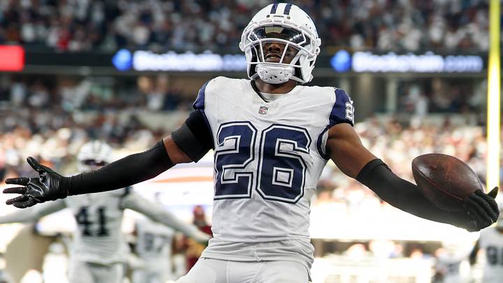 Dallas Cowboys CB Daron Bland carries the ball after an interception for a touchdown against the Washington Commanders. Dallas Cowboys CB Daron Bland carries the ball after an interception for a touchdown against the Washington Commanders.