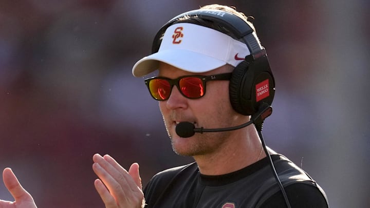 Aug 30, 2025; Los Angeles, California, USA; Southern California Trojans head coach Lincoln Riley watches from the sidelines against the Missouri State Bears in the first half at United Airlines Field at Los Angeles Memorial Coliseum. Mandatory Credit: Kirby Lee-Imagn Images